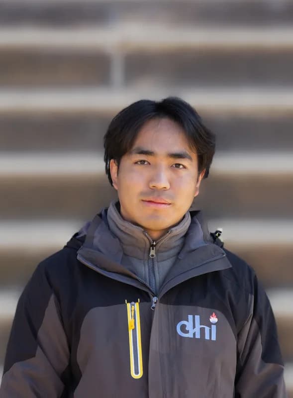 Tenzin Kuenkhyab, Associate Analyst